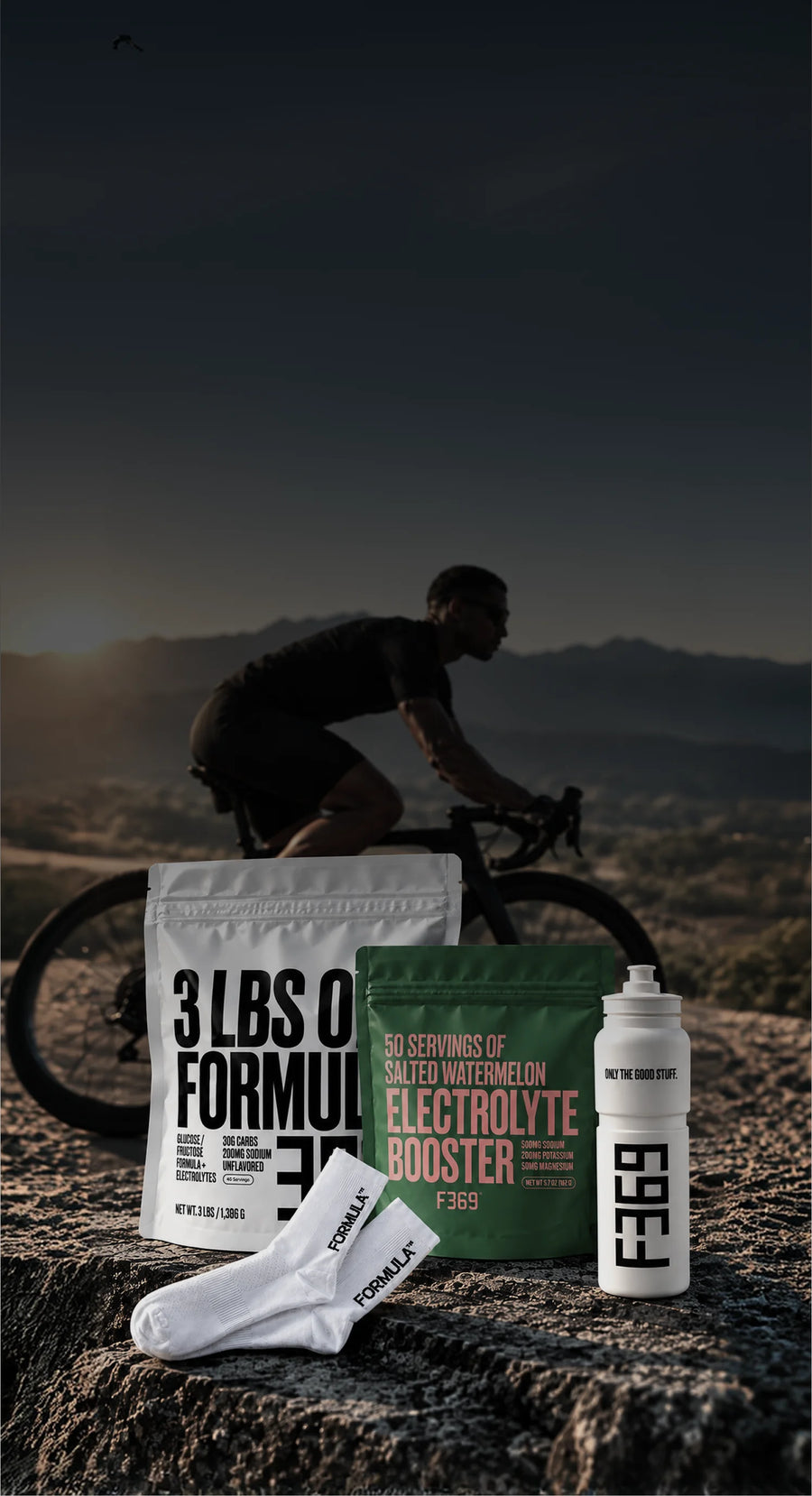 Cyclist at dusk with the Formula 369 starter pack: recovery drink mix, electrolyte booster, socks, and water bottle